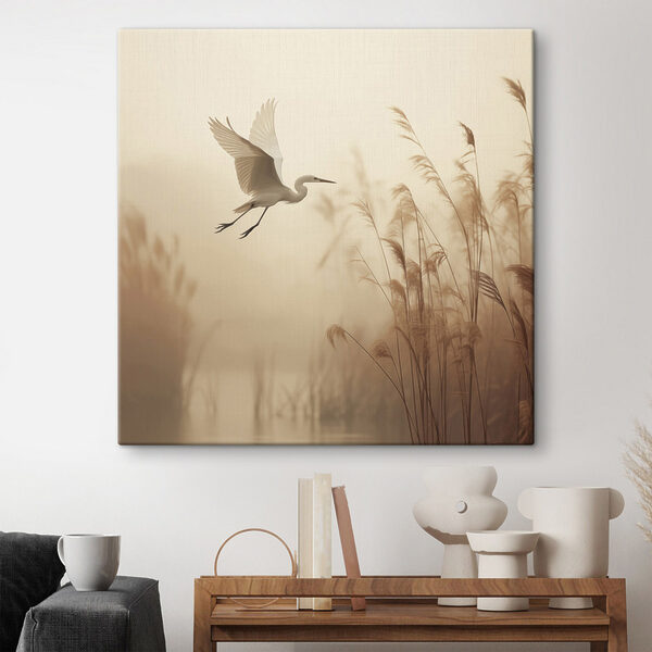 Bird flying over water