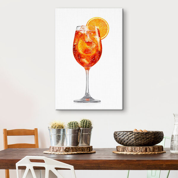 Glass of orange drink with ice and a slice of orange
