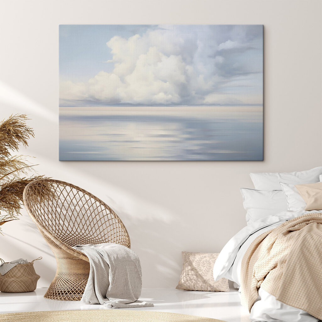 Large body of water with clouds in the sky