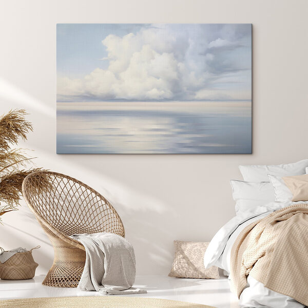Large body of water with clouds in the sky