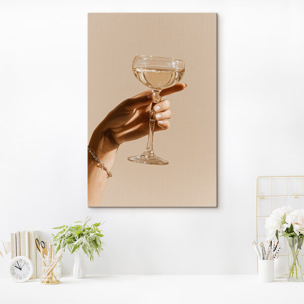 Hand holding a glass of wine