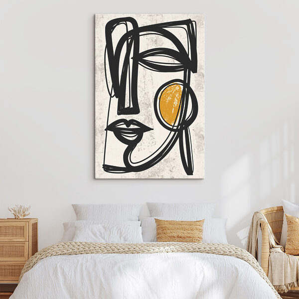 Black and yellow drawing of a face