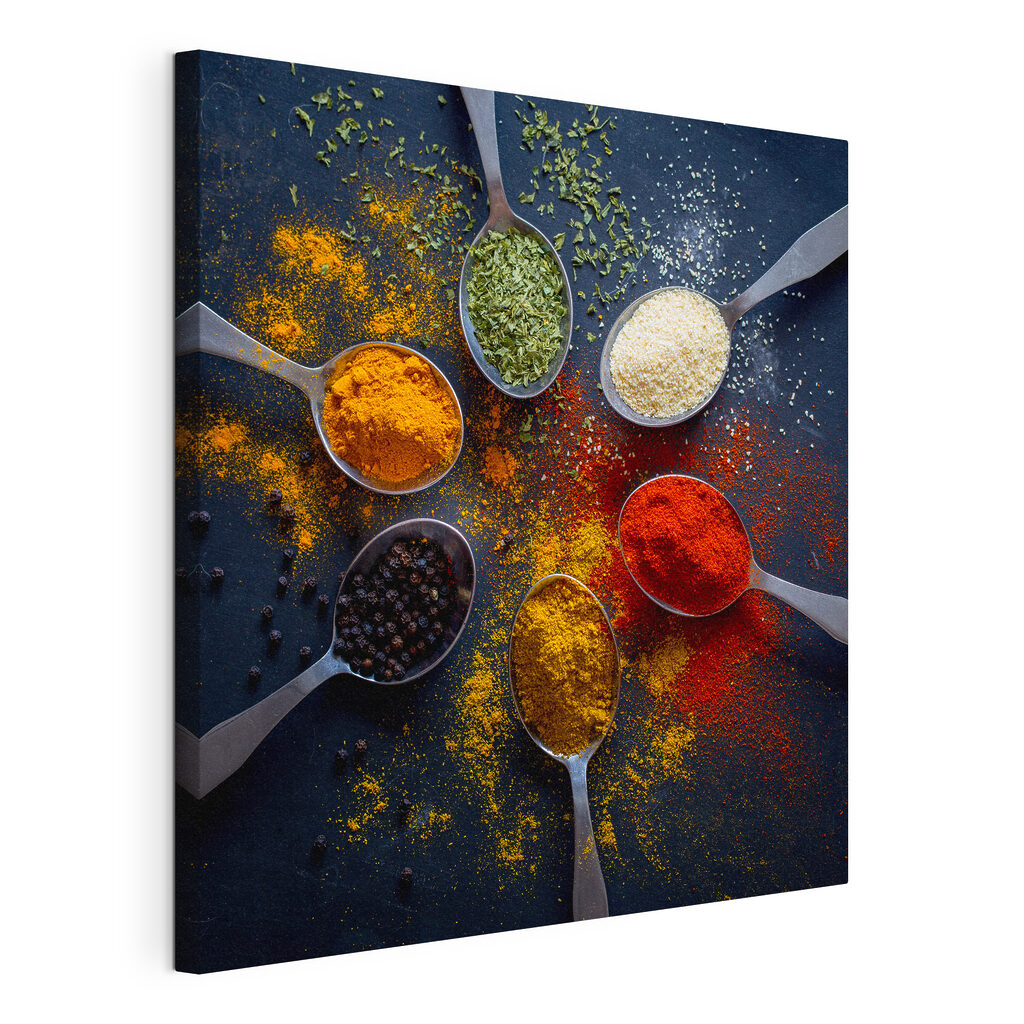 A group of spoons with different spices A group of spoons with different spices