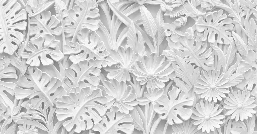White wall with flowers and leaves