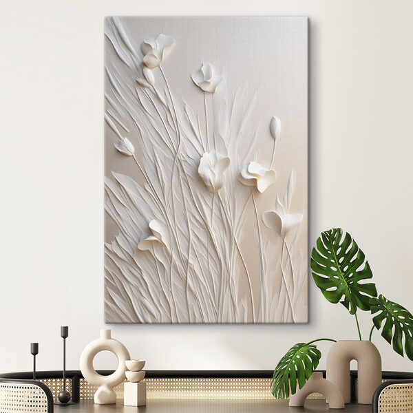 White flowers and leaves on a white surface